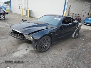 2012 Ford Mustang GT Premium with VIN 1ZVBP8CF9C5238579, listed as a Copart auction lot 71851995 with 107,269 mi miles and Salvage title. Bid and sale history available at DreamBid. Image 1.