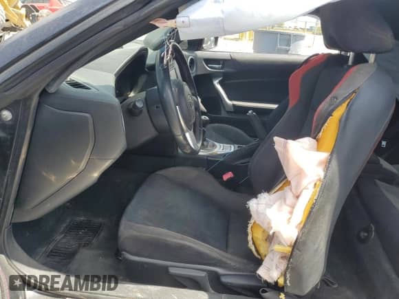 2016 Scion FR-S with VIN JF1ZNAA18G9705694, listed as a Copart auction lot 69179845 with 98,710 mi miles and Salvage title. Bid and sale history available at DreamBid. Image 7.