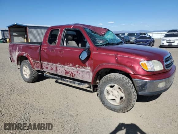 2001 Toyota Tundra Limited z VIN 5TBBT48181S165094, wystawiony jako Copart lot #55515765 z przebiegiem 264 859 mil mil oraz Czysty tytuł • Clean title. Historia ofert i sprzedaży dostępna na DreamBid. Obrazek 4.