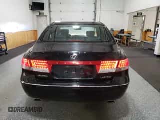 2006 Hyundai Azera SE с VIN KMHFC46F46A056168, выставлен на аукционе Copart как лот 85765045 с пробегом 103 335 миль миль и Чистый • Clean title. История ставок и продаж доступна на DreamBid. Изображение 6.