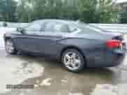 2014 Chevrolet Impala LS with VIN 2G11X5SL9E9290720, listed as a Copart auction lot 58586525 with 296,863 mi miles and Salvage title. Bid and sale history available at DreamBid. Image 2.