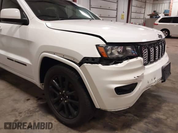 2020 Jeep Grand Cherokee Altitude with VIN 1C4RJFAGXLC104551, listed as a IAAI auction lot 42723807 with 90,917 mi miles and . Bid and sale history available at DreamBid. Image 20.
