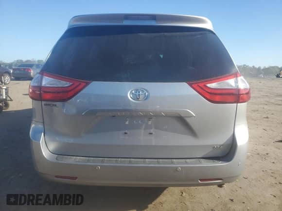 2016 Toyota Sienna XLE with VIN 5TDYK3DCXGS748698, listed as a Copart auction lot 84625385 with 93,932 mi miles and Salvage title. Bid and sale history available at DreamBid. Image 6.