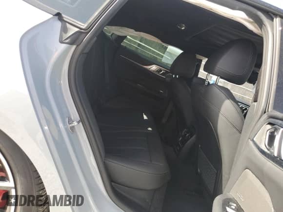 2024 BMW i4 eDrive40 with VIN WBY73AW05RFT21513, listed as a Copart auction lot 66119785 with 15,130 mi miles and Salvage title. Bid and sale history available at DreamBid. Image 10.