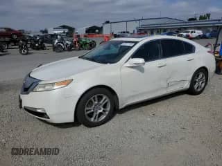 2009 Acura TL с VIN 19UUA86239A002002, выставлен на аукционе Copart как лот 81917715 с пробегом 144 118 миль миль и Списание • Salvage title. История ставок и продаж доступна на DreamBid. Изображение 1.