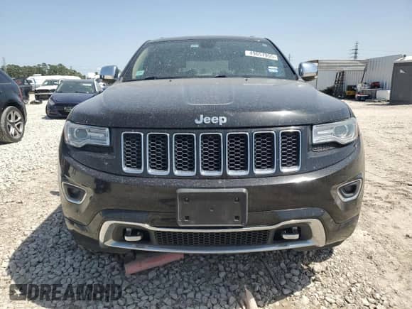 2015 Jeep Grand Cherokee High Altitude with VIN 1C4RJECGXFC906464, listed as a Copart auction lot 49657955 with 125,239 mi miles and Salvage title. Bid and sale history available at DreamBid. Image 5.