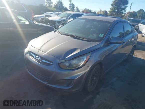 2014 Hyundai Accent GLS with VIN KMHCT4AE9EU597960, listed as a IAAI auction lot 43476423 with 192,794 mi miles and . Bid and sale history available at DreamBid. Image 2.