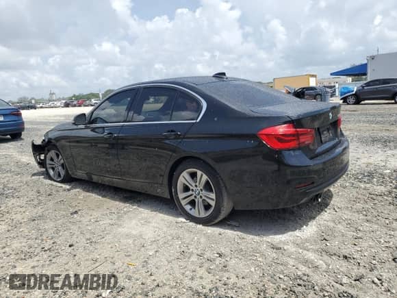 2017 BMW 3 Series 330i with VIN WBA8B9C50HK884656, listed as a Copart auction lot 62298725 with 97,648 mi miles and Salvage title. Bid and sale history available at DreamBid. Image 2.