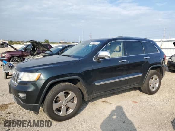 2013 Jeep Grand Cherokee Limited z VIN 1C4RJFBG7DC648943, wystawiony jako Copart lot #85731515 z przebiegiem 200 146 mil mil oraz Szkoda całkowita • Salvage title. Historia ofert i sprzedaży dostępna na DreamBid. Obrazek 1.