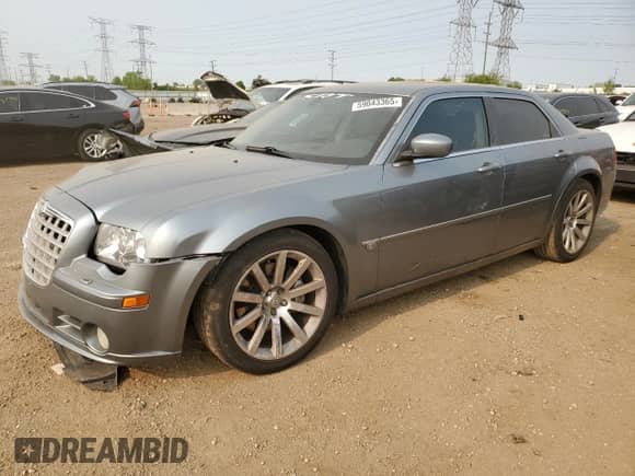 2006 Chrysler 300 C SRT-8 z VIN 2C3LA73W66H426657, wystawiony jako Copart lot #59043365 z przebiegiem 159 188 mil mil oraz Szkoda całkowita • Salvage title. Historia ofert i sprzedaży dostępna na DreamBid. Obrazek 1.