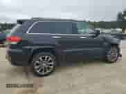 2017 Jeep Grand Cherokee Overland with VIN 1C4RJFCG8HC940430, listed as a Copart auction lot 68780995 with 150,371 mi miles and Salvage title. Bid and sale history available at DreamBid. Image 3.