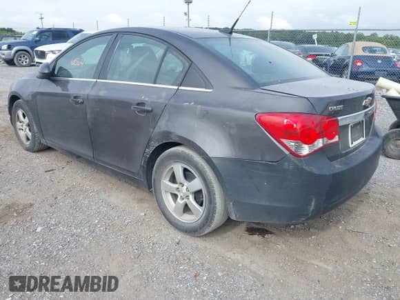 2014 Chevrolet Cruze 1LT with VIN 1G1PC5SB8E7338769, listed as a IAAI auction lot 43186564 with 115,065 mi miles and . Bid and sale history available at DreamBid. Image 3.