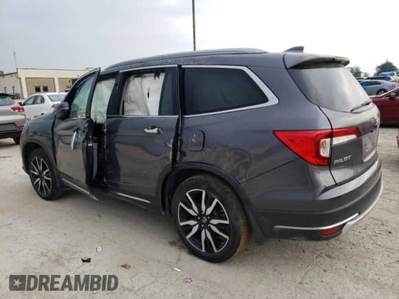 2021 Honda Pilot Elite z VIN 5FNYF6H04MB094240, wystawiony jako Copart lot #63920225 z przebiegiem 50 312 mil mil oraz Szkoda całkowita • Salvage title. Historia ofert i sprzedaży dostępna na DreamBid. Obrazek 2.