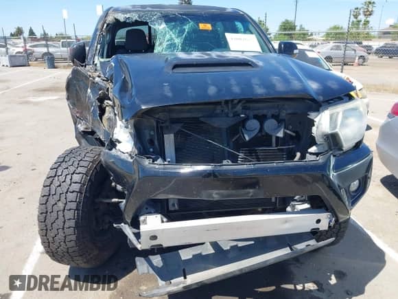 2014 Toyota Tacoma PreRunner with VIN 3TMKU4HN6EM041841, listed as a IAAI auction lot 42082629 with Not provided miles and . Bid and sale history available at DreamBid. Image 17.