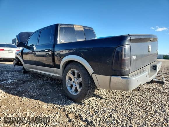 2010 Dodge 1500 Laramie with VIN 1D7RV1CT5AS213137, listed as a Copart auction lot 84411635 with 185,625 mi miles and Salvage title. Bid and sale history available at DreamBid. Image 2.