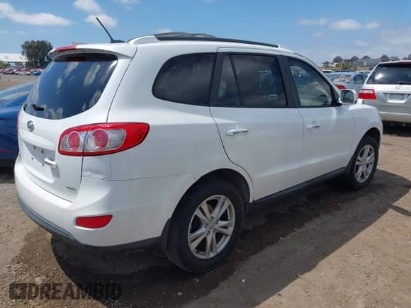 2012 Hyundai Santa Fe Limited with VIN 5XYZK4AG4CG150700, listed as a IAAI auction lot 42138342 with 128,893 mi miles and . Bid and sale history available at DreamBid. Image 4.