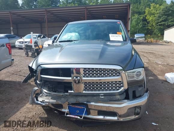 2013 Ram 1500 Laramie with VIN 1C6RR7NT1DS571846, listed as a IAAI auction lot 42870271 with 171,715 mi miles and . Bid and sale history available at DreamBid. Image 12.