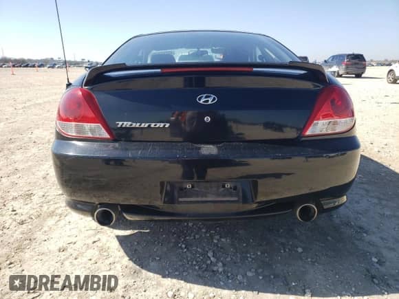 2006 Hyundai Tiburon GS с VIN KMHHM65D76U223249, выставлен на аукционе Copart как лот 45228195 с пробегом 45 420 миль миль и Списание • Salvage title. История ставок и продаж доступна на DreamBid. Изображение 6.