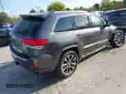 2017 Jeep Grand Cherokee Overland with VIN 1C4RJFCG4HC729662, listed as a IAAI auction lot 43282727 with 138,876 mi miles and . Bid and sale history available at DreamBid. Image 4.