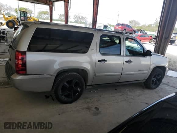 2007 Chevrolet Suburban LT z VIN 3GNFC16Y47G267093, wystawiony jako Copart lot #77914934 z przebiegiem 188 405 mil mil oraz Szkoda całkowita • Salvage title. Historia ofert i sprzedaży dostępna na DreamBid. Obrazek 3.