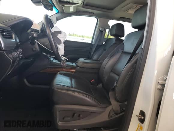 2018 Chevrolet Tahoe Premier with VIN 1GNSKCKJXJR251316, listed as a Copart auction lot 61205895 with 134,233 mi miles and Salvage title. Bid and sale history available at DreamBid. Image 7.