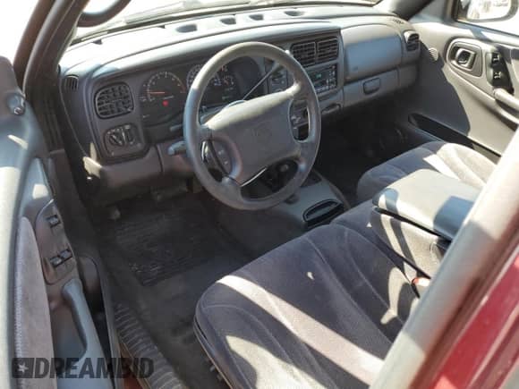 2000 Dodge Dakota Sport with VIN 1B7GG22NXYS547713, listed as a Copart auction lot 69386895 with 118,074 mi miles and Salvage title. Bid and sale history available at DreamBid. Image 8.