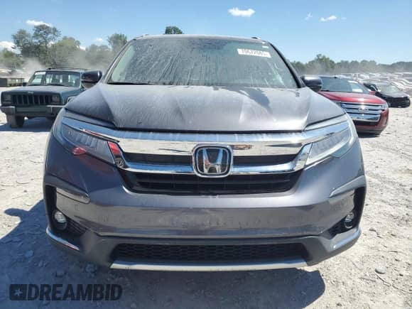 2019 Honda Pilot Touring 8-Passenger with VIN 5FNYF6H99KB033154, listed as a Copart auction lot 70672085 with 104,300 mi miles and Salvage title. Bid and sale history available at DreamBid. Image 5.