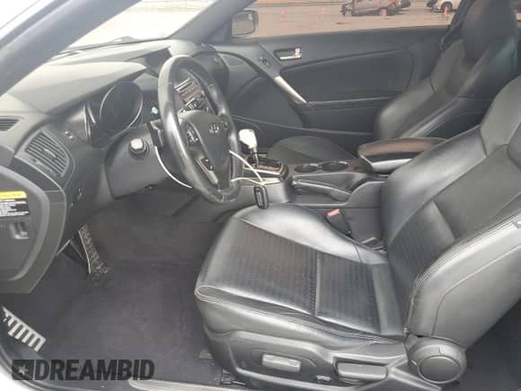 2013 Hyundai Genesis Coupe R-Spec с VIN KMHHU6KJ7DU102700, выставлен на аукционе Copart как лот 66547434 с пробегом 83 345 миль миль и Списание • Salvage title. История ставок и продаж доступна на DreamBid. Изображение 7.