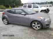 2014 Hyundai Veloster z VIN KMHTC6AD8EU196161, wystawiony jako Copart lot #82244385 z przebiegiem 146 717 mil mil oraz Czysty tytuł • Clean title. Historia ofert i sprzedaży dostępna na DreamBid. Obrazek 4.