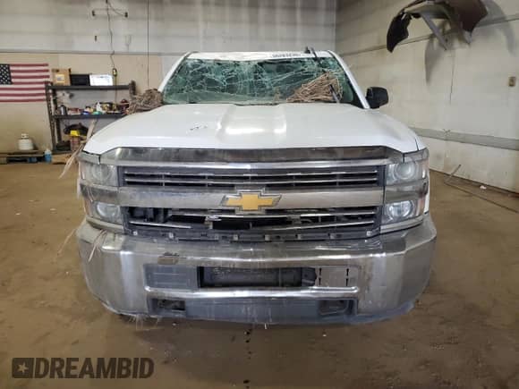 2015 Chevrolet Silverado 2500HD Work Truck z VIN 1GC1KUEG5FF652954, wystawiony jako Copart lot #56283235 z przebiegiem 235 014 mil mil oraz Szkoda całkowita • Salvage title. Historia ofert i sprzedaży dostępna na DreamBid. Obrazek 5.
