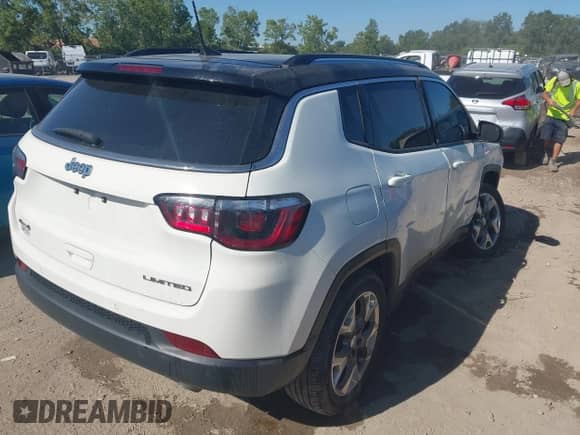 2021 Jeep Compass Limited with VIN 3C4NJDCB7MT546066, listed as a IAAI auction lot 43006523 with 77,114 mi miles and . Bid and sale history available at DreamBid. Image 4.