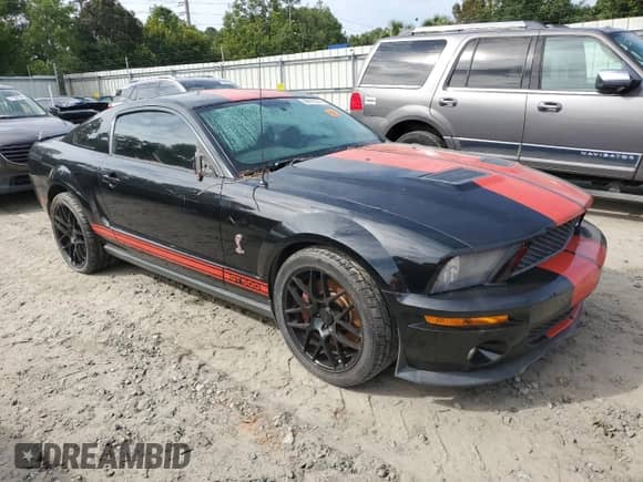 2009 Ford Mustang Shelby GT500 z VIN 1ZVHT88S995128314, wystawiony jako Copart lot #68973314 z przebiegiem 74 339 mil mil oraz Szkoda całkowita • Salvage title. Historia ofert i sprzedaży dostępna na DreamBid. Obrazek 4.