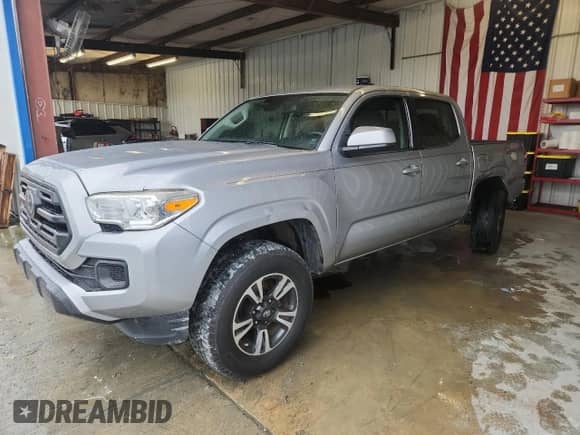 2018 Toyota Tacoma SR z VIN 5TFAX5GN7JX118697, wystawiony jako Copart lot #67840425 z przebiegiem 89 753 mil mil oraz Szkoda całkowita • Salvage title. Historia ofert i sprzedaży dostępna na DreamBid. Obrazek 1.