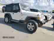 2001 Jeep Wrangler Sport с VIN 1J4FA49S01P305620, выставлен на аукционе Copart как лот 85516025 с пробегом Не указан миль и Списание • Salvage title. История ставок и продаж доступна на DreamBid. Изображение 4.