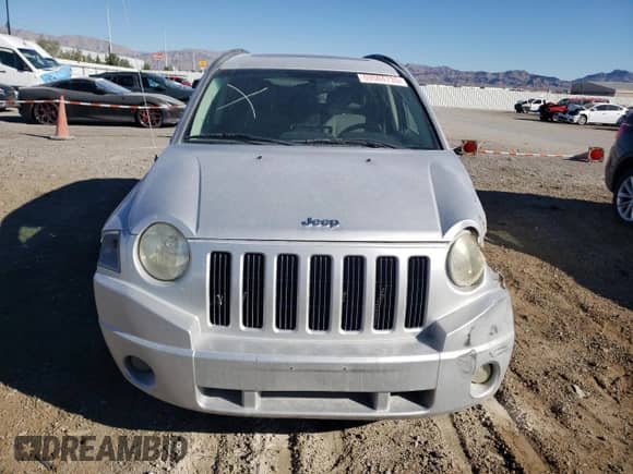 2007 Jeep Compass Sport with VIN 1J8FF47W47D136671, listed as a Copart auction lot 69504735 with Not provided miles and Salvage title. Bid and sale history available at DreamBid. Image 5.