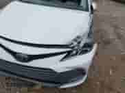 2023 Toyota Camry LE z VIN 4T1C11AKXPU770849, wystawiony jako IAAI lot #43338006 z przebiegiem 64 765 mil mil oraz . Historia ofert i sprzedaży dostępna na DreamBid. Obrazek 17.