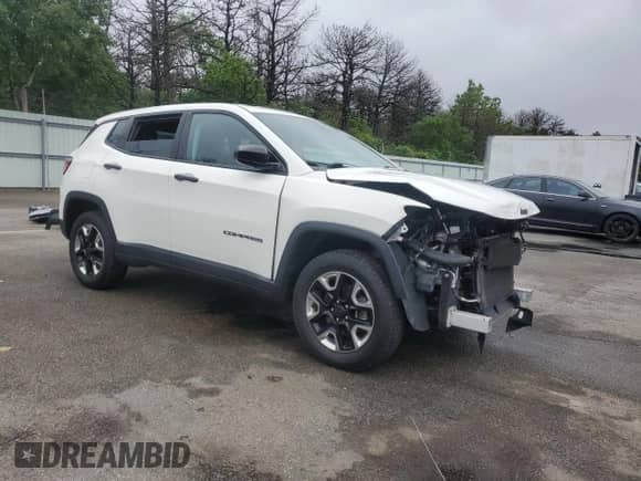 2017 Jeep Compass Sport with VIN 3C4NJDAB4HT667078, listed as a Copart auction lot 59717965 with 59,785 mi miles and Salvage title. Bid and sale history available at DreamBid. Image 4.