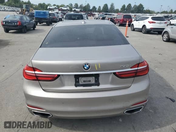 2017 BMW 7 Series 740i с VIN WBA7E2C3XHG741287, выставлен на аукционе Copart как лот 81467345 с пробегом 112 218 миль миль и Списание • Salvage title. История ставок и продаж доступна на DreamBid. Изображение 6.