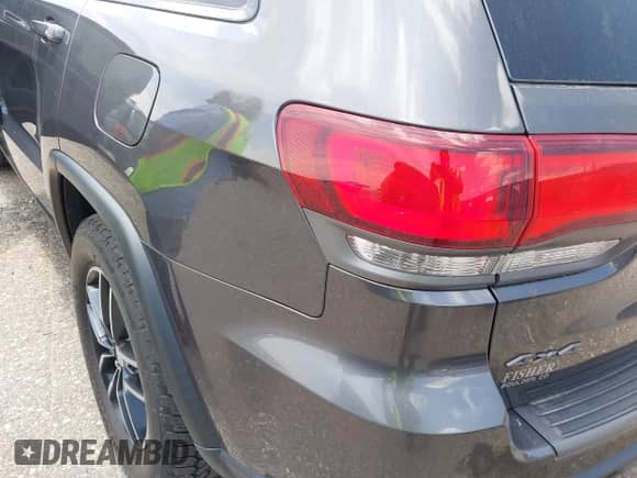 2017 Jeep Grand Cherokee Trailhawk z VIN 1C4RJFLG9HC932921, wystawiony jako IAAI lot #42418874 z przebiegiem Nie podano mil oraz . Historia ofert i sprzedaży dostępna na DreamBid. Obrazek 6.