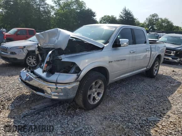 2012 Ram 1500 Laramie z VIN 1C6RD6NT8CS182094, wystawiony jako Copart lot #60243985 z przebiegiem 272 541 mil mil oraz Szkoda całkowita • Salvage title. Historia ofert i sprzedaży dostępna na DreamBid. Obrazek 1.