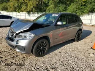 2017 BMW X5 xDrive35i with VIN 5UXKR0C53H0V66718, listed as a Copart auction lot 71563095 with 101,819 mi miles and Salvage title. Bid and sale history available at DreamBid. Image 1.