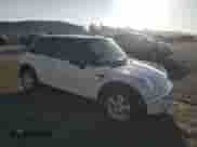 2006 MINI Hardtop with VIN WMWRC33536TK66138, listed as a Copart auction lot 81620335 with 128,877 mi miles and Salvage title. Bid and sale history available at DreamBid. Image 4.