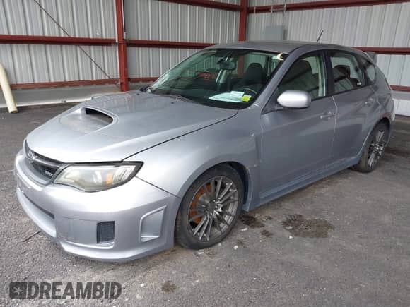 2013 Subaru WRX WRX with VIN JF1GR7E6XDG824780, listed as a IAAI auction lot 42447957 with 105,198 mi miles and . Bid and sale history available at DreamBid. Image 2.