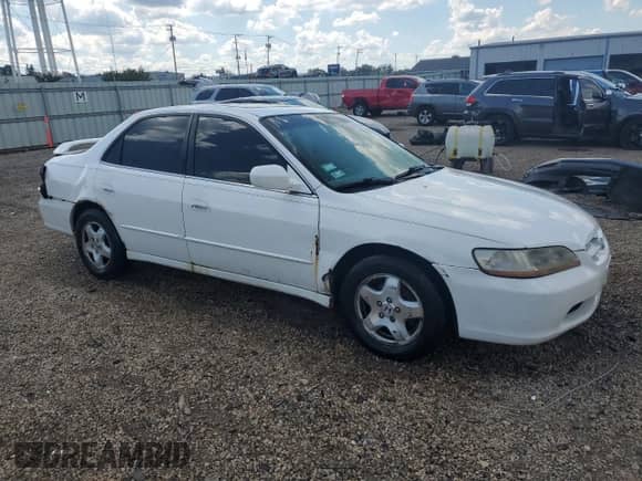 1999 Honda Accord EX with VIN 1HGCG1653XA013722, listed as a Copart auction lot 71023805 with 217,852 mi miles and Salvage title. Bid and sale history available at DreamBid. Image 4.