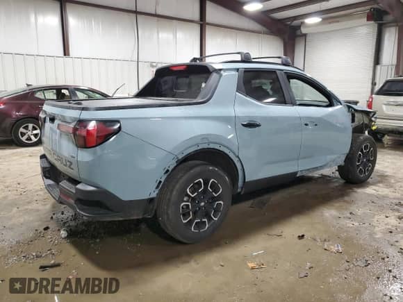 2022 Hyundai Santa Cruz SEL with VIN 5NTJCDAE8NH021204, listed as a Copart auction lot 38367164 with 27,642 mi miles and . Bid and sale history available at DreamBid. Image 3.