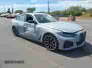 2024 BMW i4 eDrive40 with VIN WBY73AW07RFT27491, listed as a IAAI auction lot 43109104 with 10,833 mi miles and . Bid and sale history available at DreamBid. Image 1.