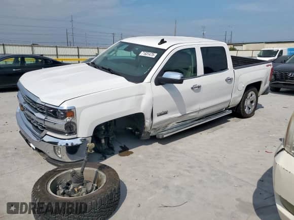 2018 Chevrolet Silverado 1500 LTZ z VIN 3GCUKSEC0JG391335, wystawiony jako Copart lot #71831475 z przebiegiem 127 301 mil mil oraz Szkoda całkowita • Salvage title. Historia ofert i sprzedaży dostępna na DreamBid. Obrazek 1.