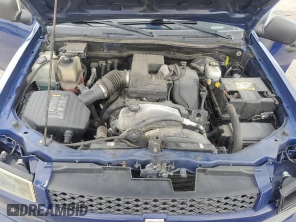 2012 Chevrolet Colorado 1LT with VIN 1GCGTCFEXC8112224, listed as a Copart auction lot 69041855 with 122,575 mi miles and Salvage title. Bid and sale history available at DreamBid. Image 11.