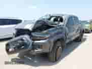 2021 Toyota Tacoma SR5 with VIN 5TFAZ5CN1MX118036, listed as a IAAI auction lot 42840652 with 73,082 mi miles and . Bid and sale history available at DreamBid. Image 2.