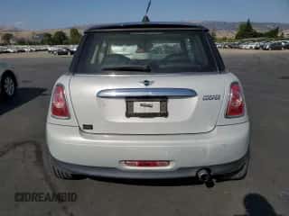 2013 MINI Hardtop with VIN WMWSU3C58DT371379, listed as a Copart auction lot 59606005 with 59,901 mi miles and Salvage title. Bid and sale history available at DreamBid. Image 6.